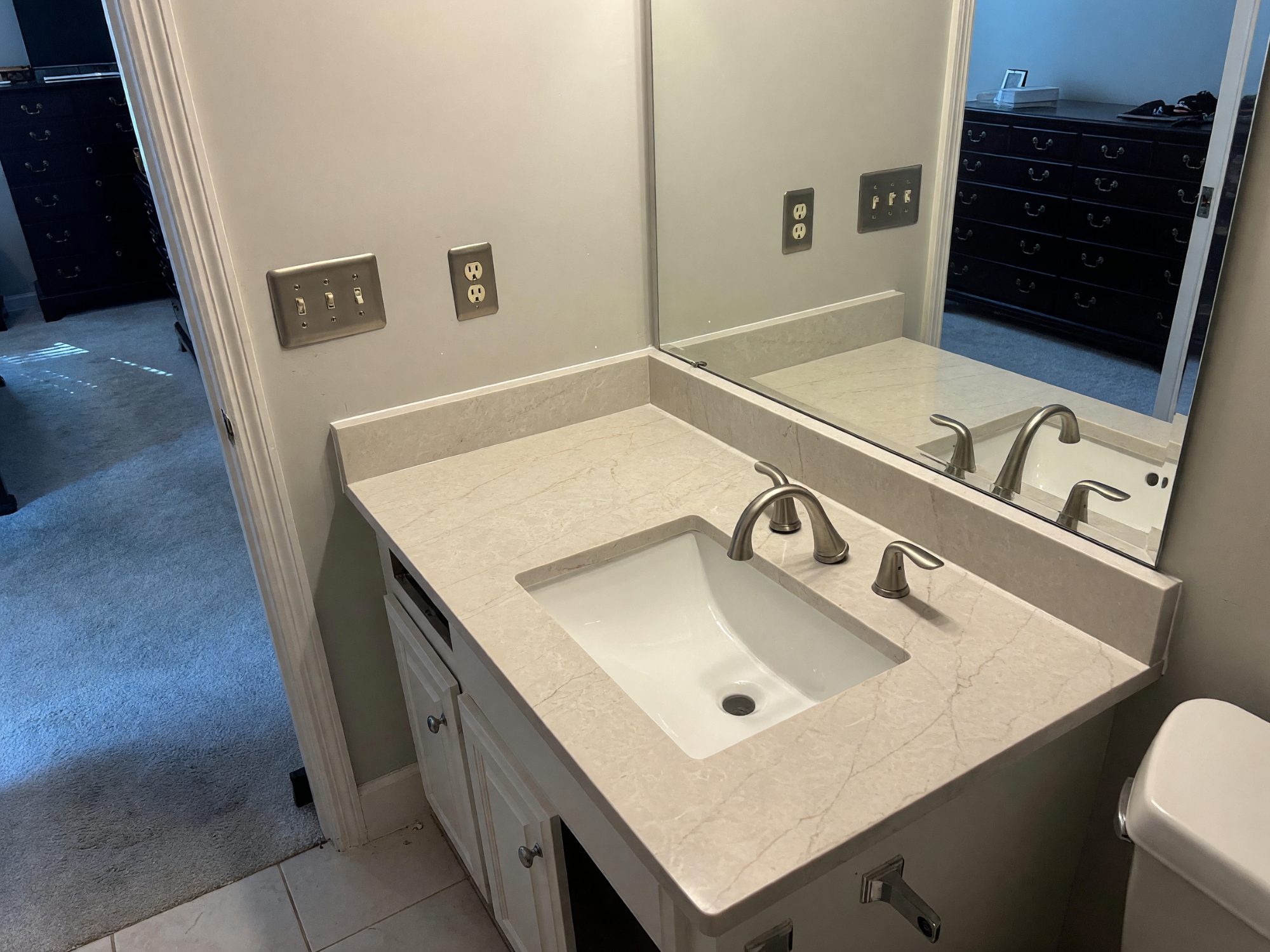 White quartz bathroom vanity in Forest Acres