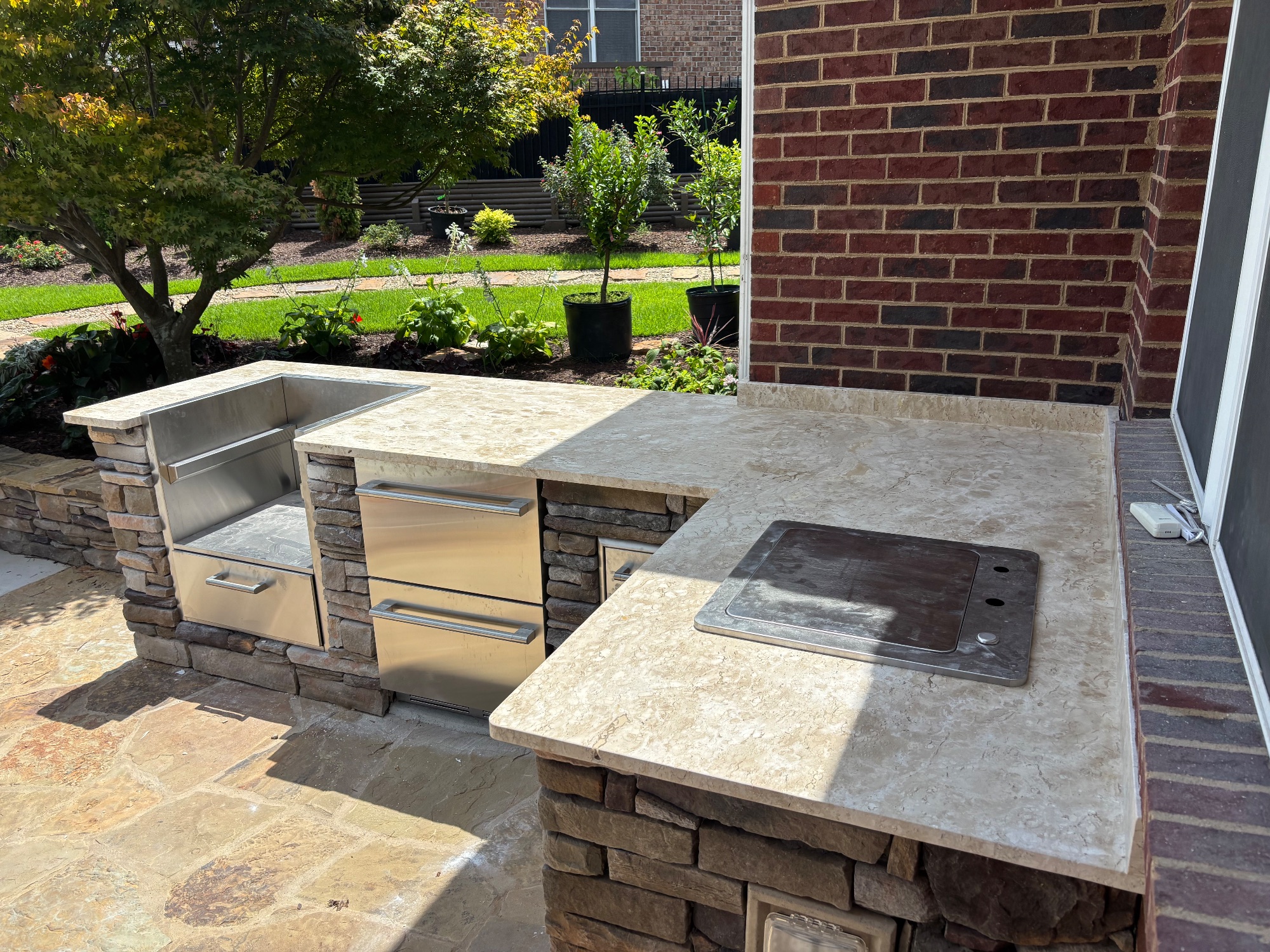 Lexington outdoor kitchen in unfilled travertine